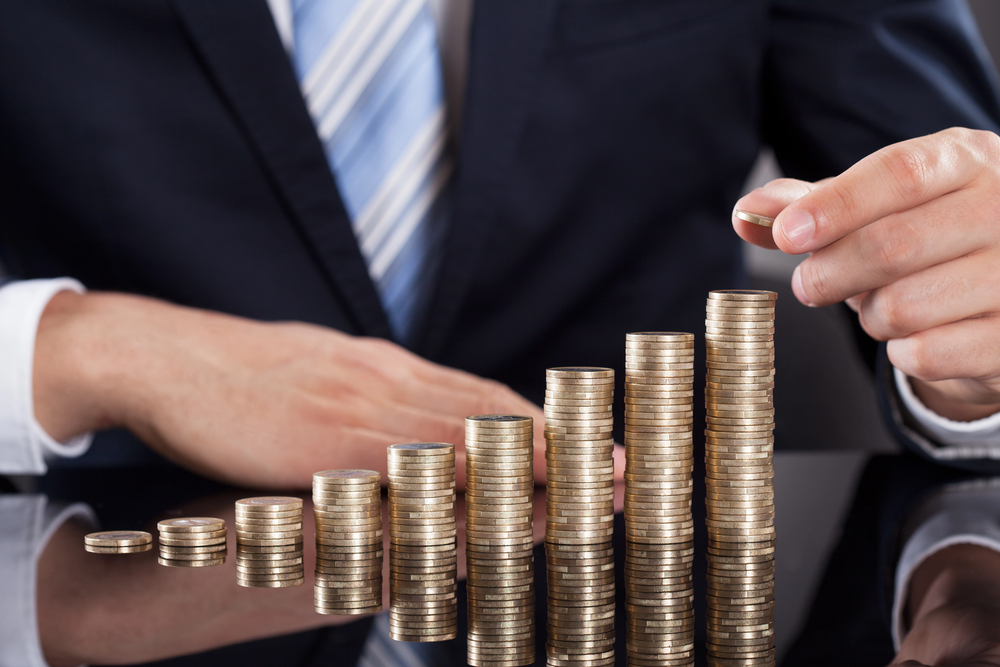 Man and gold coins