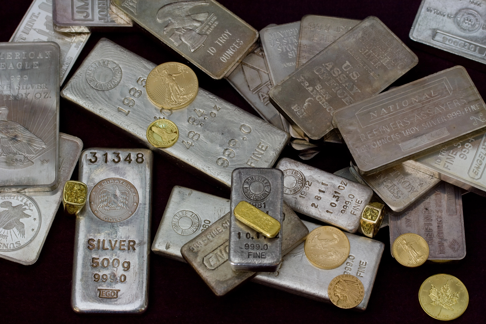 silver bars and gold